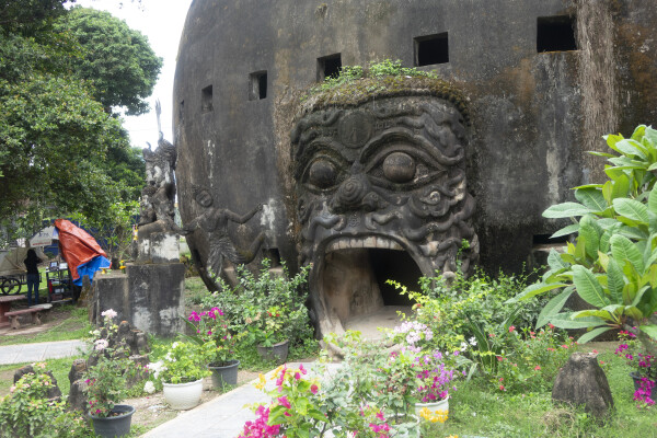 Hide between the Buddha Park statues near Vientiane
