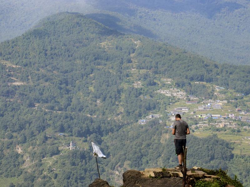Man on top of mountain