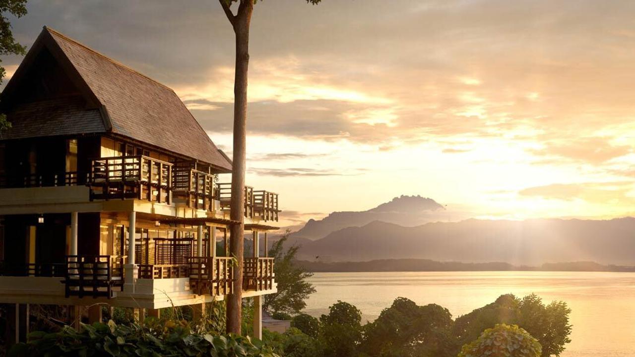 Sunset over the mountains at Gaya Island Resort