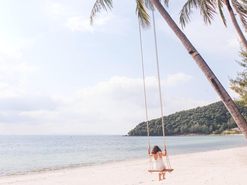 woman on swing on koh russey