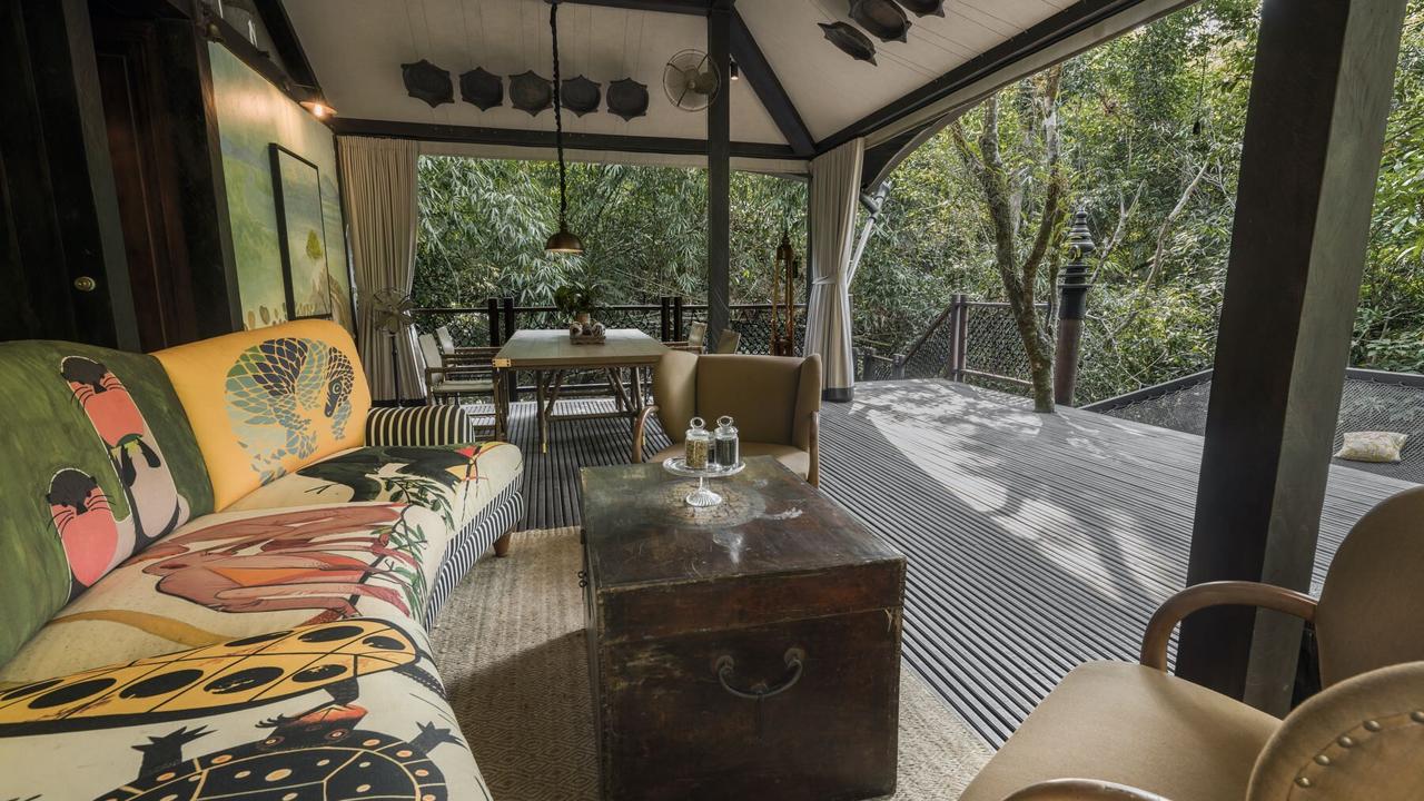 Seating area with colourful sofa at Shinta Mani Wild