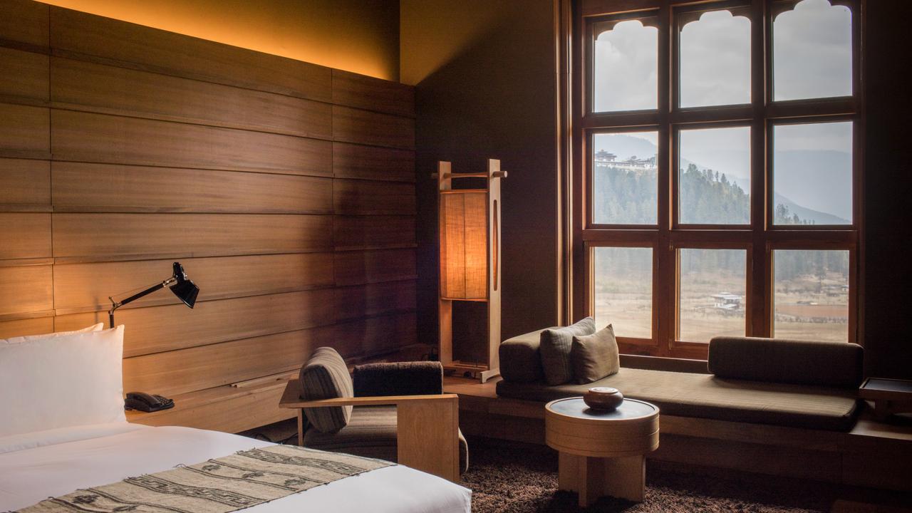 Bedroom at Gangtey Lodge with view across valley
