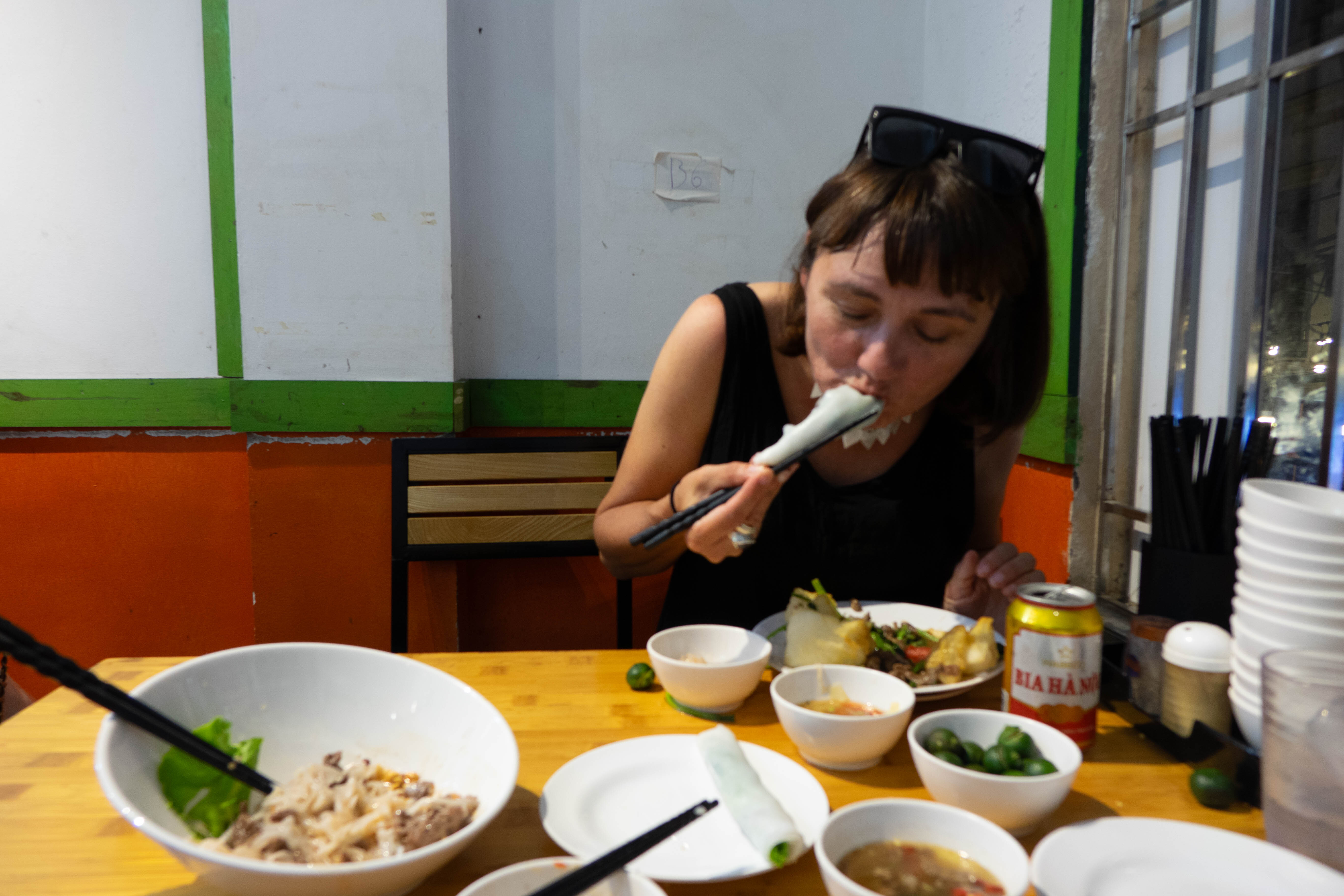 Kate eating pho cuon in Hanoi