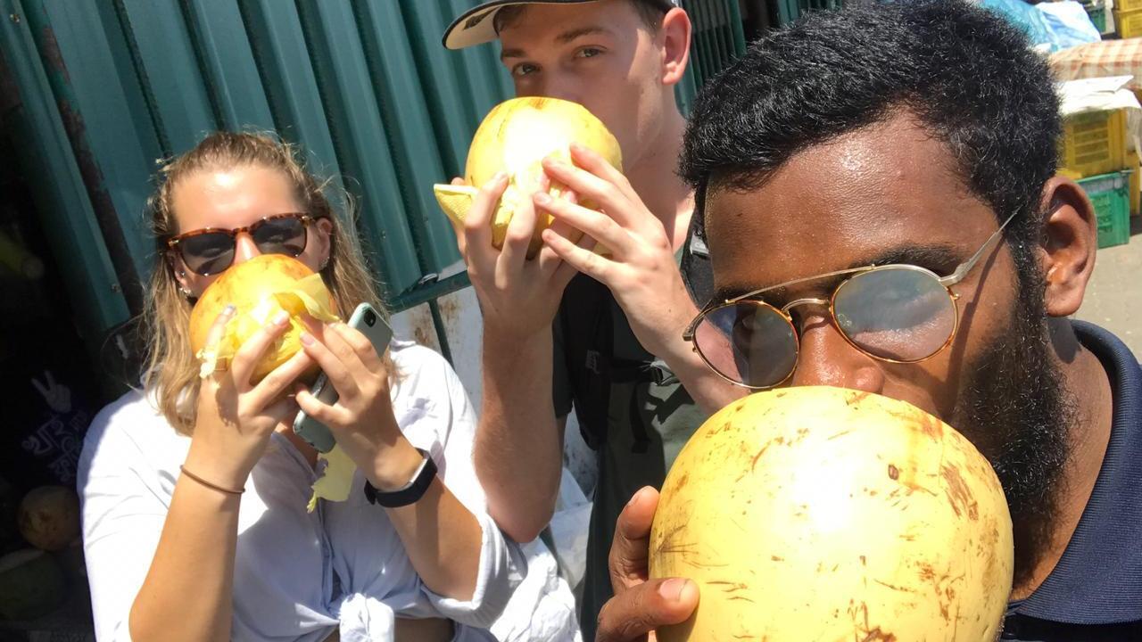 People eating fruit in the Maldives