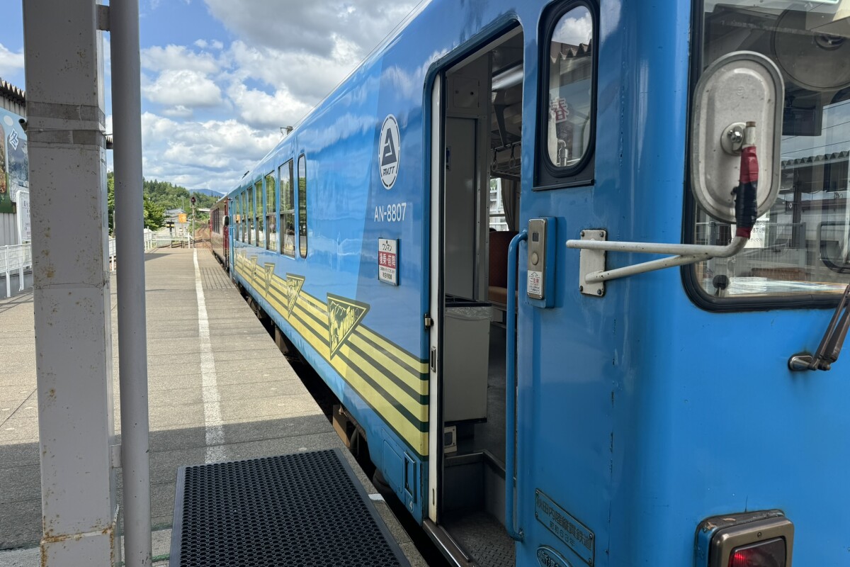 Train at a station in rural Japan